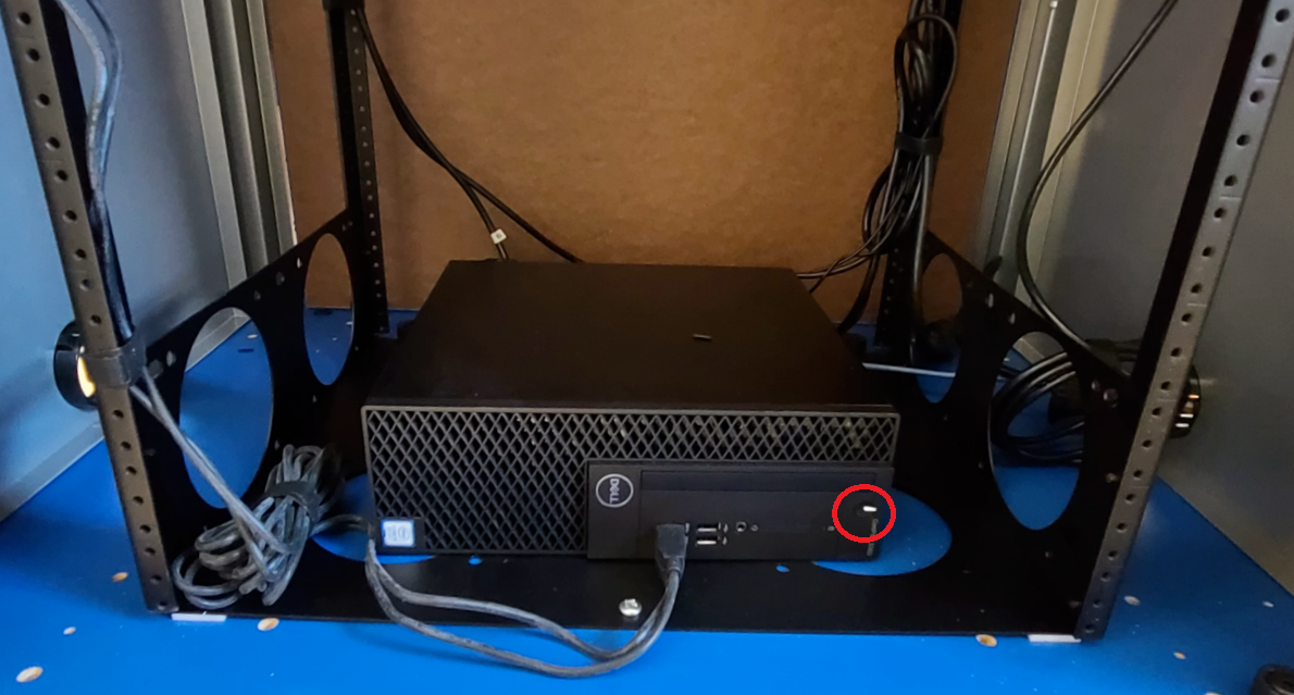 Find the Power Button on Podium Computers – Aurora University